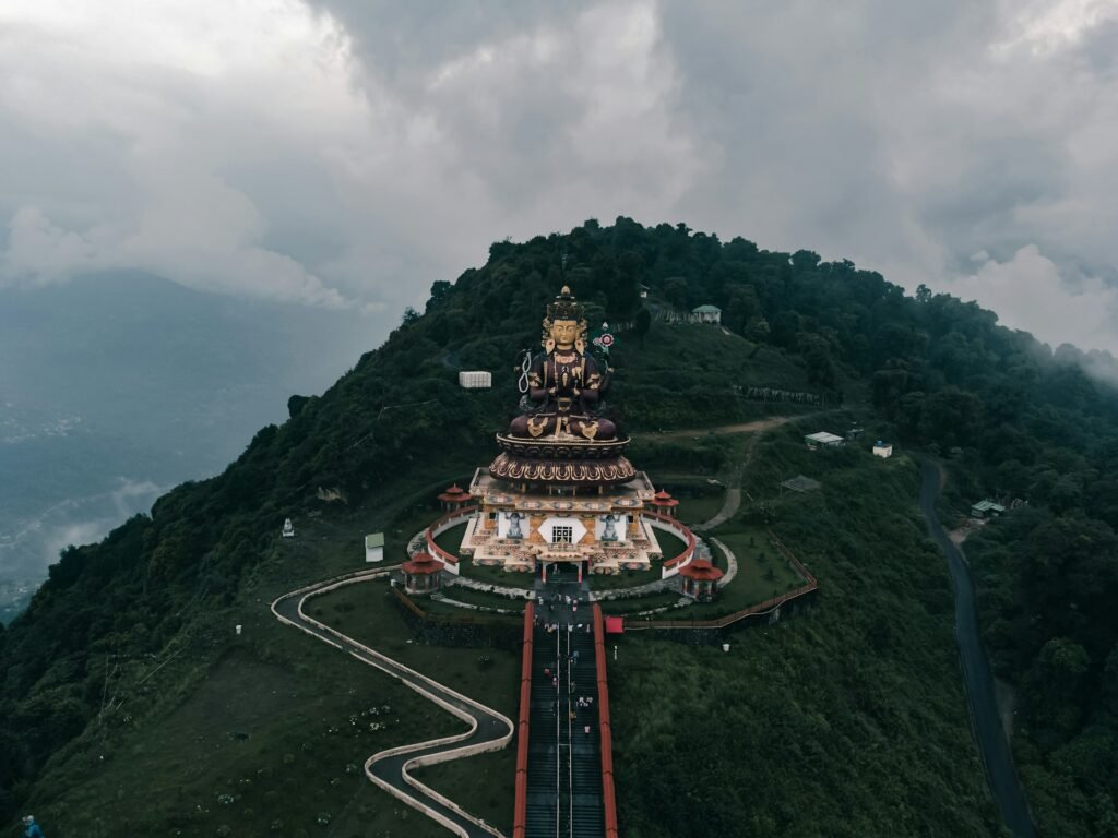 Hilltop Buddhist statue and approach walkway in Sikkim