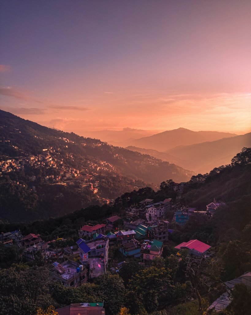 Hill town glowing at sunset in the Eastern Himalaya