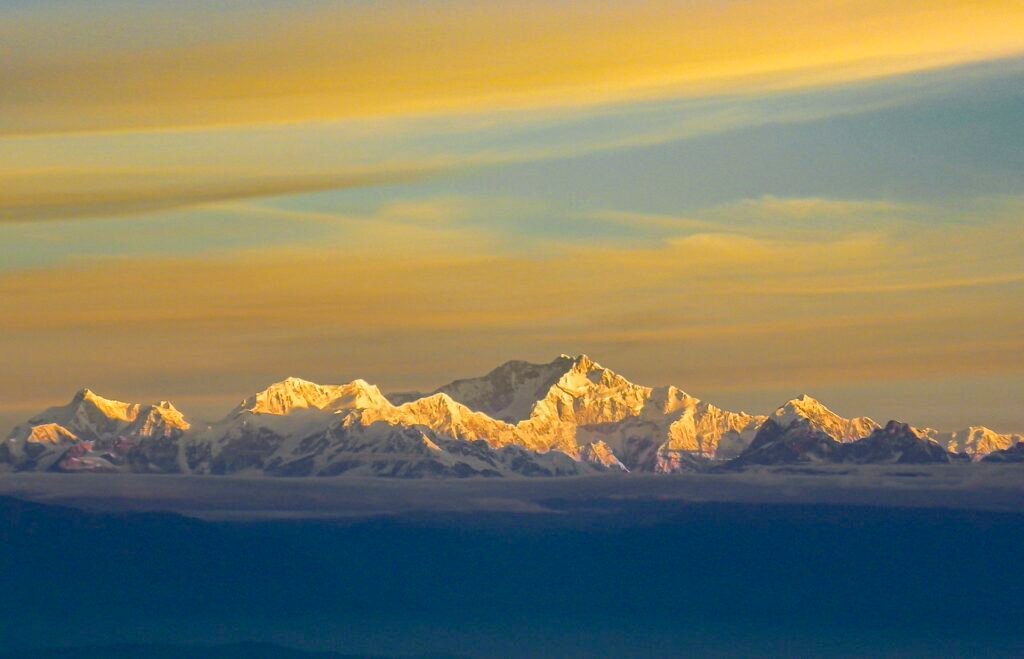 Panoramic view of the Himalayan range in golden light